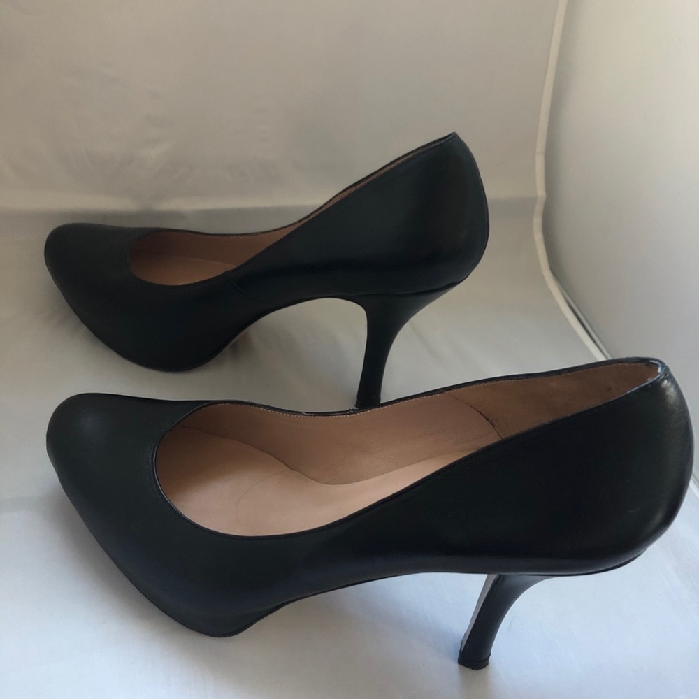 2 pairs of designer leather pumps